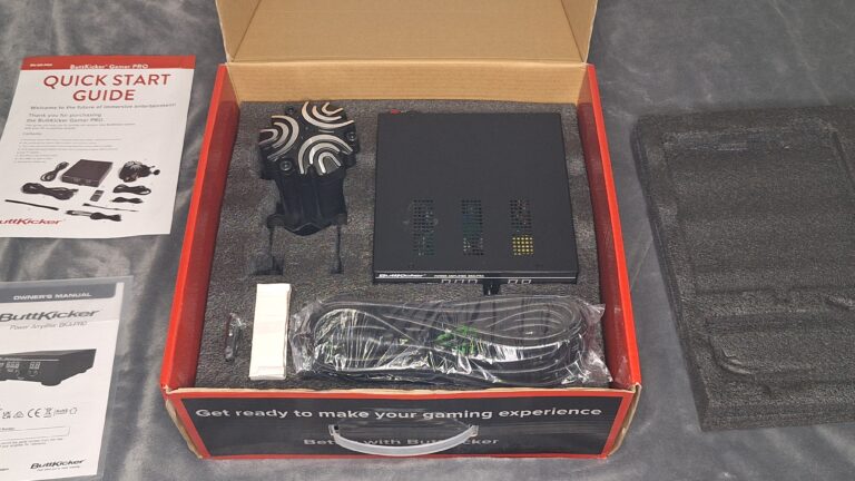 Buttkicker Gamer Pro box contents including amplifier and transducer