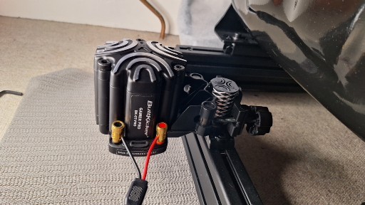 Buttkicker Gamer Pro mounted under sim racing seat on GT1 Pro rig