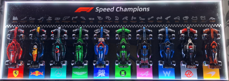 Sim Racing Made Simple 3 ICUANUTY LEGO Speed Champions Display Wall Frame with LED lights switched on