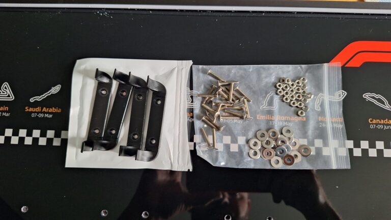 ICUANUTY LEGO Speed Champions Display Review: The Ultimate Owner's Guide (2026) 17 ICUANUTY LEGO Speed Champions display mounting brackets ready for installation