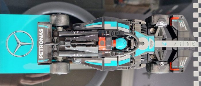 Close-up of LEGO Mercedes Speed Champions car displayed on ICUANUTY wall frame Close-up of LEGO Mercedes Speed Champions car displayed on ICUANUTY wall frame